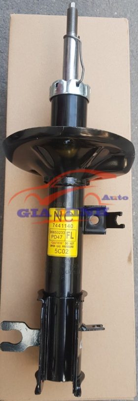 giảm xóc trước phải chevrolet aveo