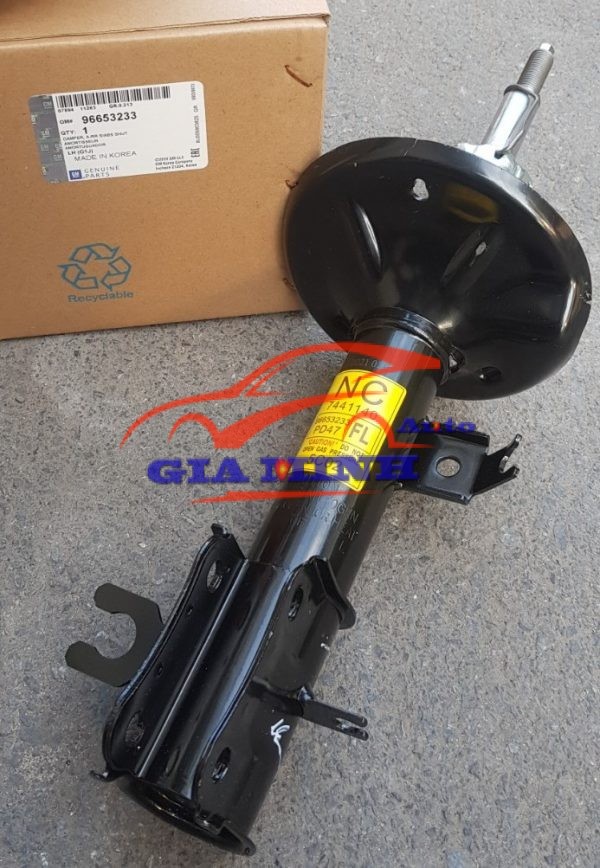 giảm xóc trước trái chevrolet aveo