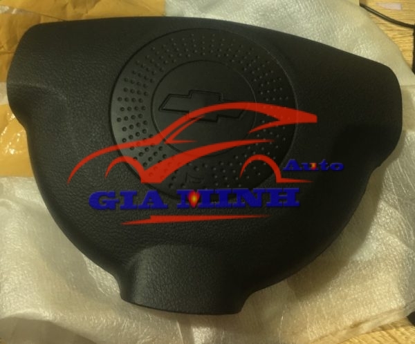 nắp đậy vô lăng chevrolet aveo
