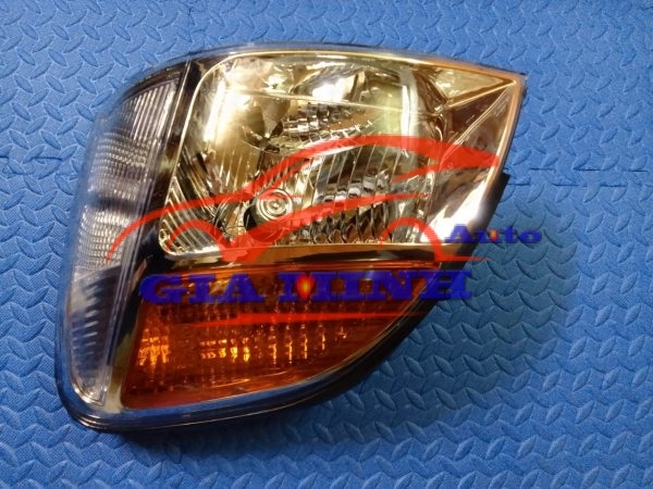 đèn pha trái hyundai starex 2005