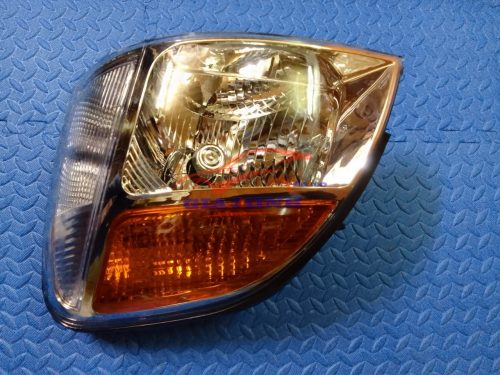 đèn pha trái hyundai starex 2005